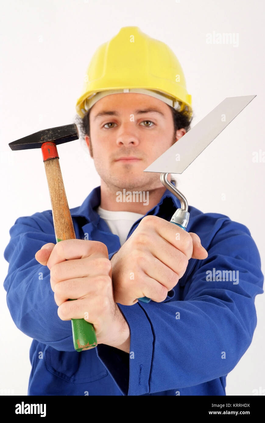 Bauarbeiter mit Blaumann, Bauhelm und Werkzeug - building worker with tools Stock Photo