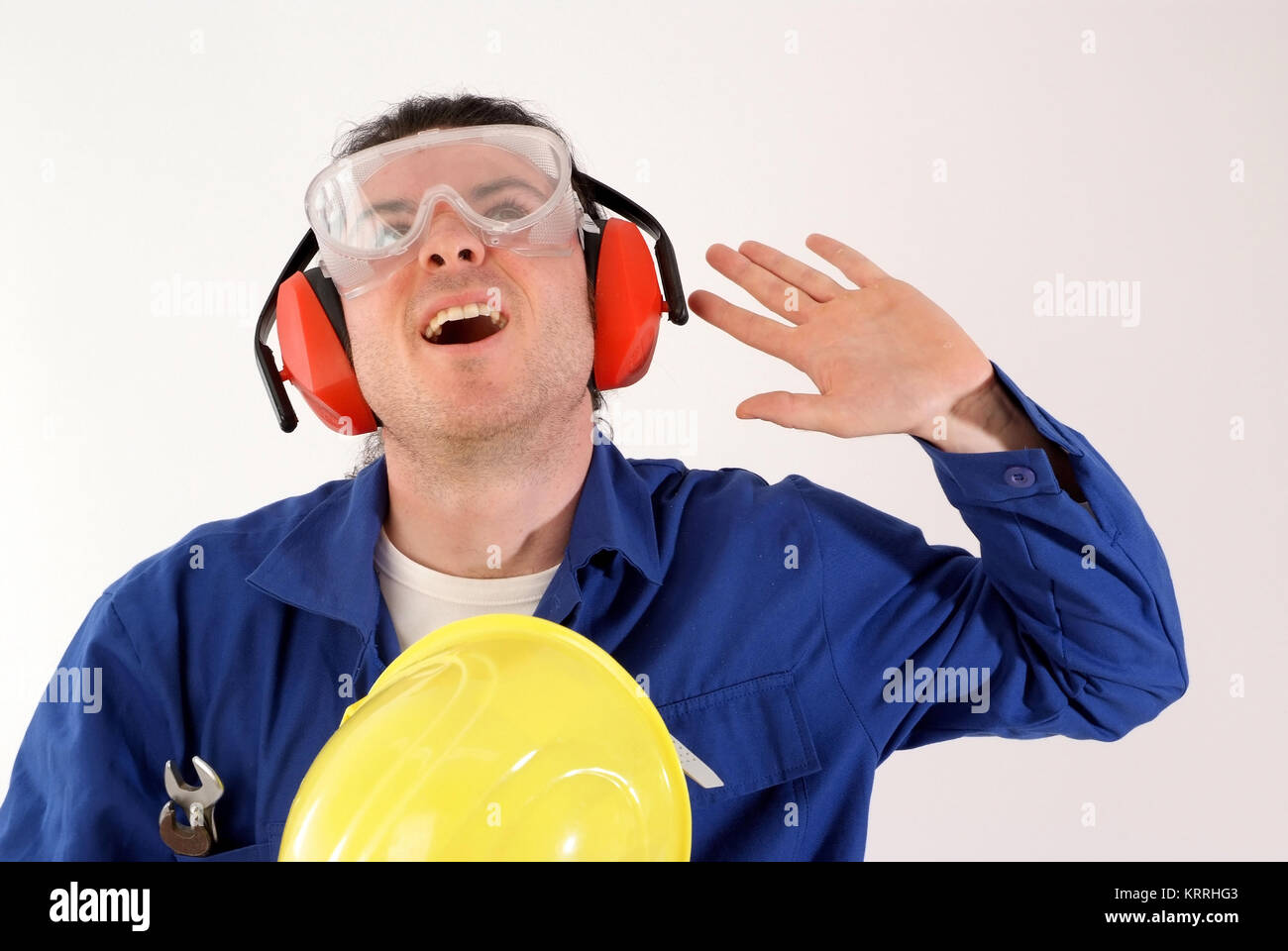 Bauarbeiter mit Gehoerschutz und Schutzbrille - building worker with ear protection Stock Photo