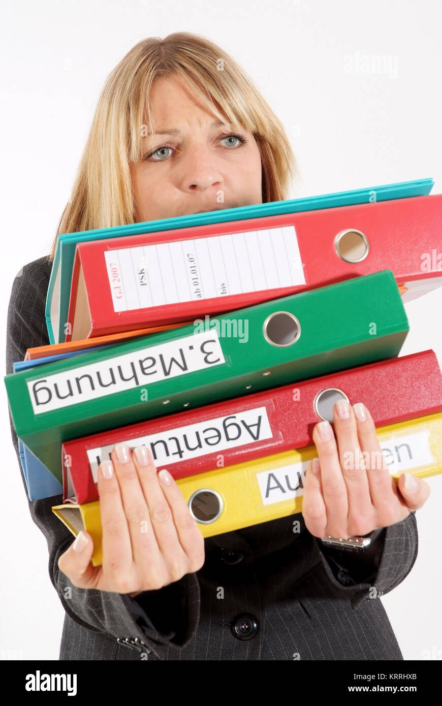 Frau schleppt schwere Akten - woman carries heavy files Stock Photo - Alamy