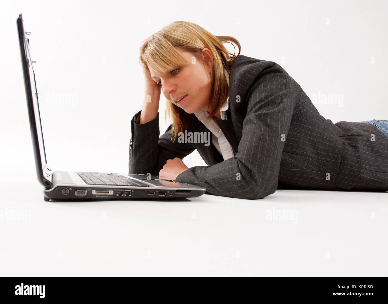 Geschaeftsfrau mit Laptop - business woman with laptop Stock Photo