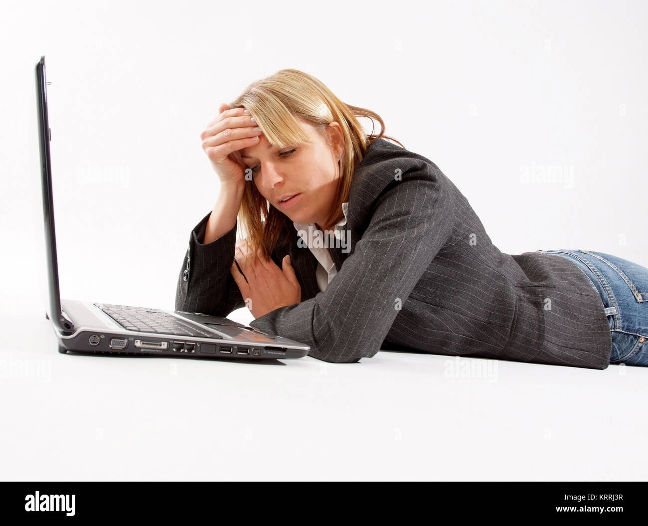 Erschoepfte Geschaeftsfrau mit Laptop - business woman with laptop Stock Photo