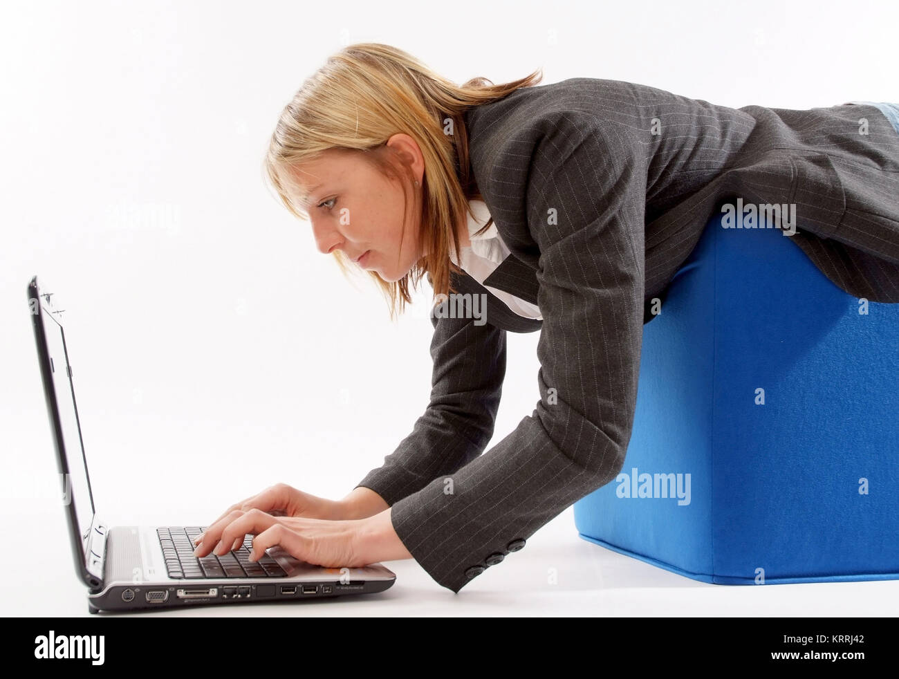 Geschaeftsfrau mit Laptop - business woman using laptop Stock Photo