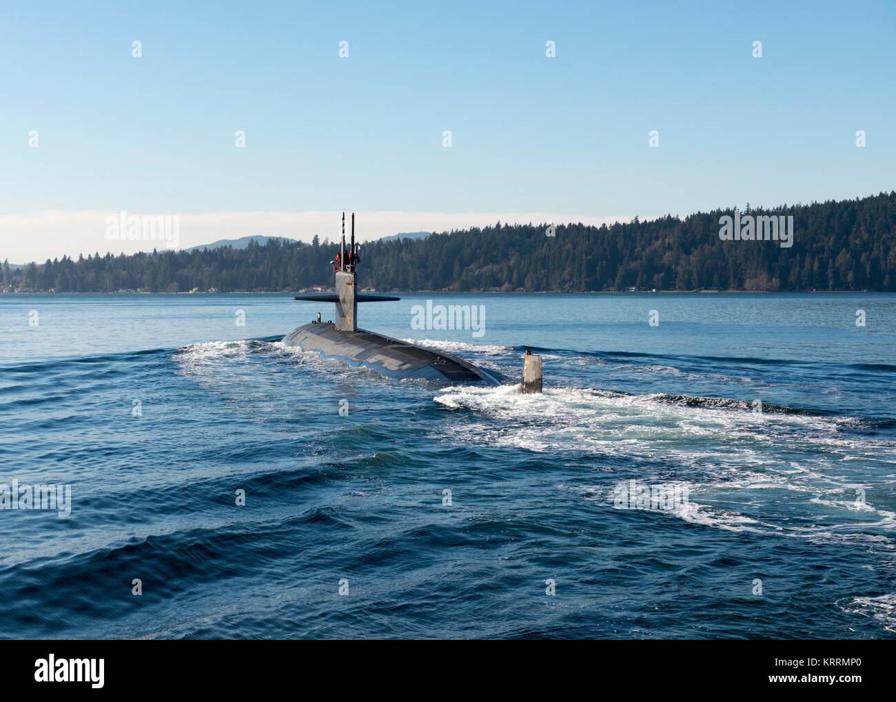 The U.S. Navy Los Angeles-class fast-attack submarine USS Jacksonville transits the Puget Sound on its way to the Naval Base Kitsap-Bremerton December 11, 2017 in Bremerton, Washington. Stock Photo
