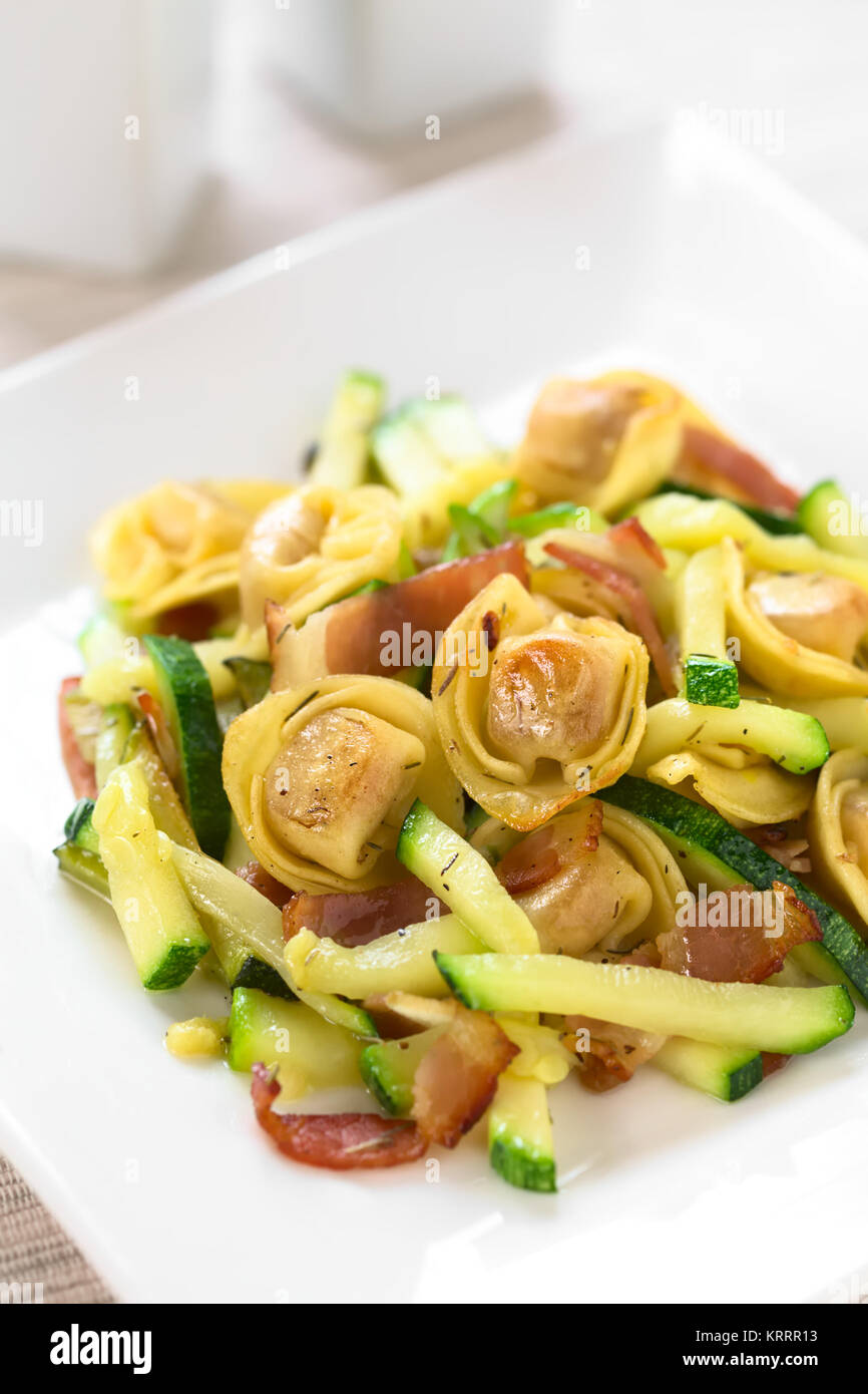 Baked Tortellini with Zucchini and Bacon Stock Photo Alamy