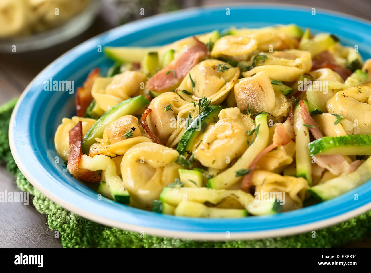 Baked Tortellini with Zucchini and Bacon Stock Photo Alamy