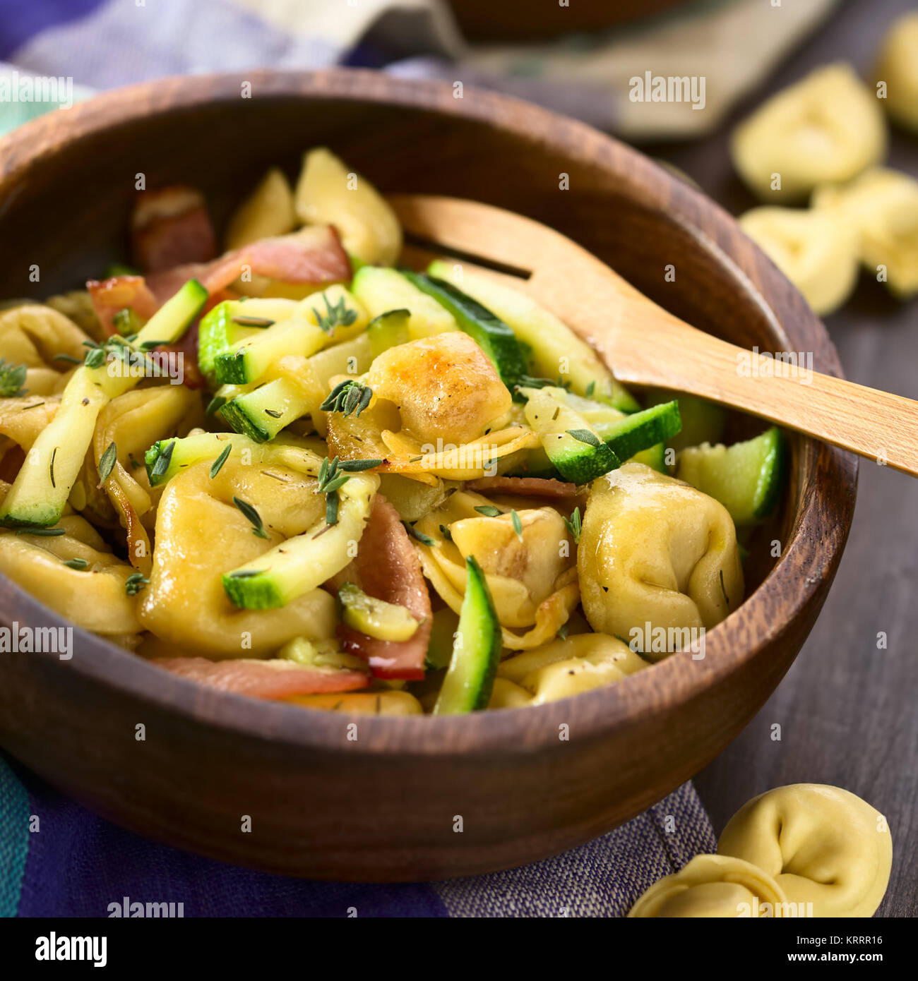 Baked Tortellini with Zucchini and Bacon Stock Photo Alamy