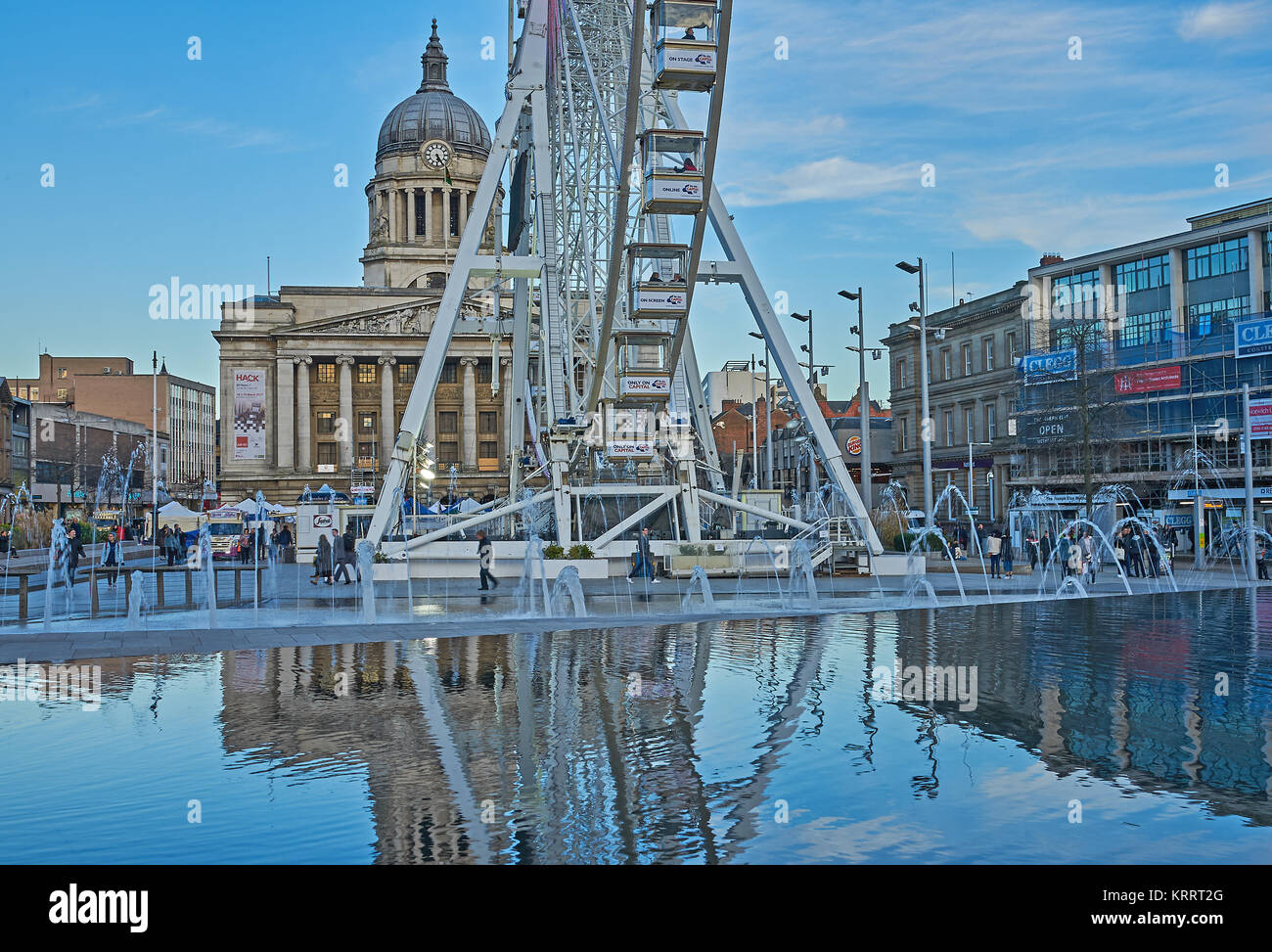 Nottingham city centre with the Council House building and Big Wheel reflected in the city centre water feature Stock Photo