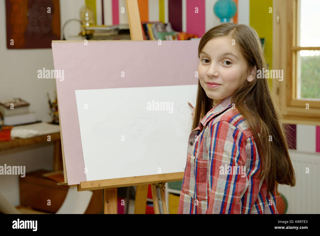 Smiling young artist girl draw Stock Photo Alamy