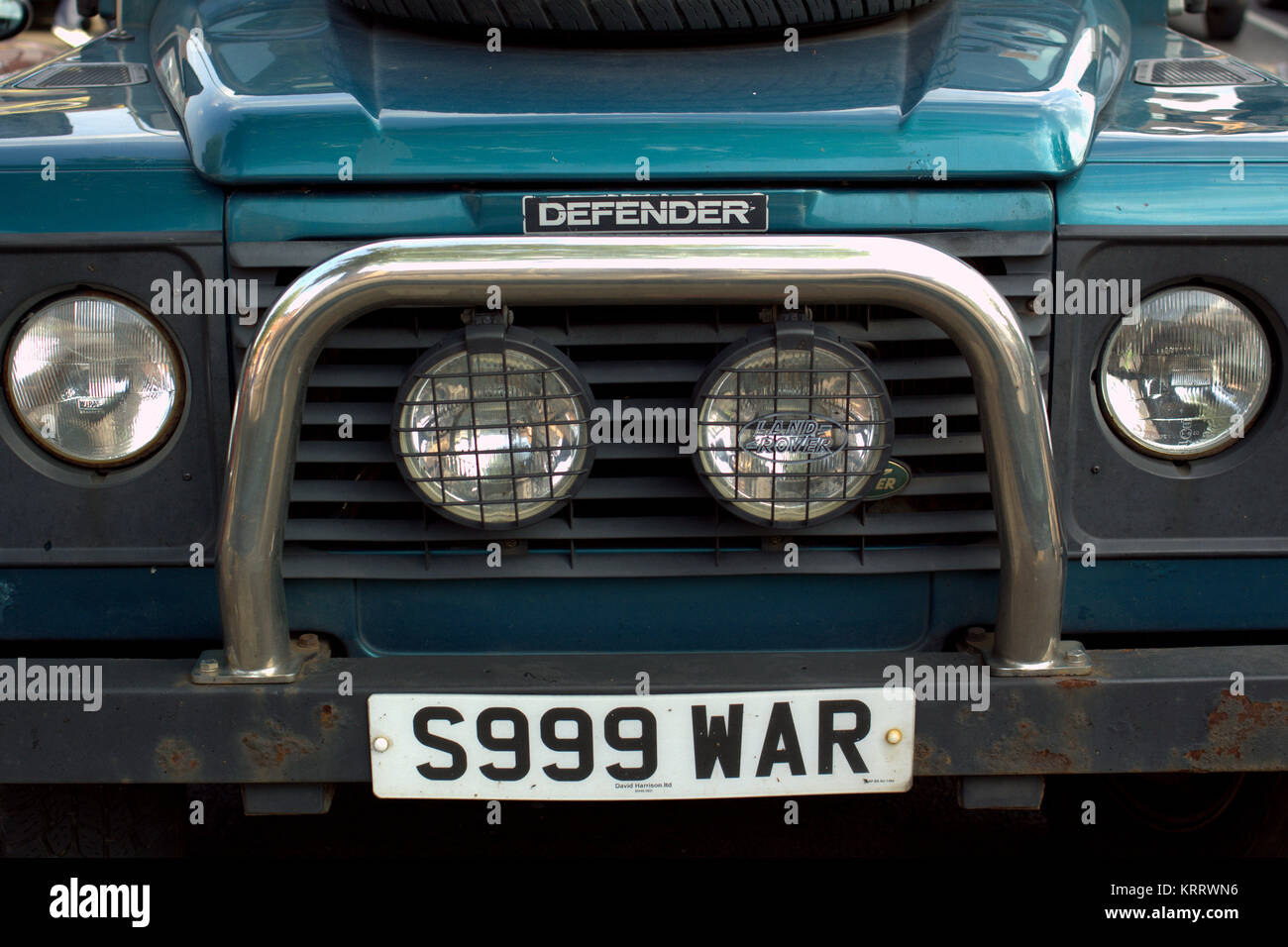 landrover defender car with war number plate Stock Photo