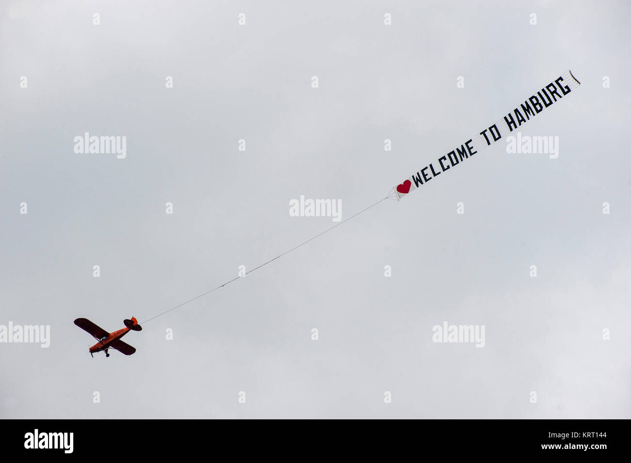 Airplane with Message: Welcome to Hamburg! Stock Photo