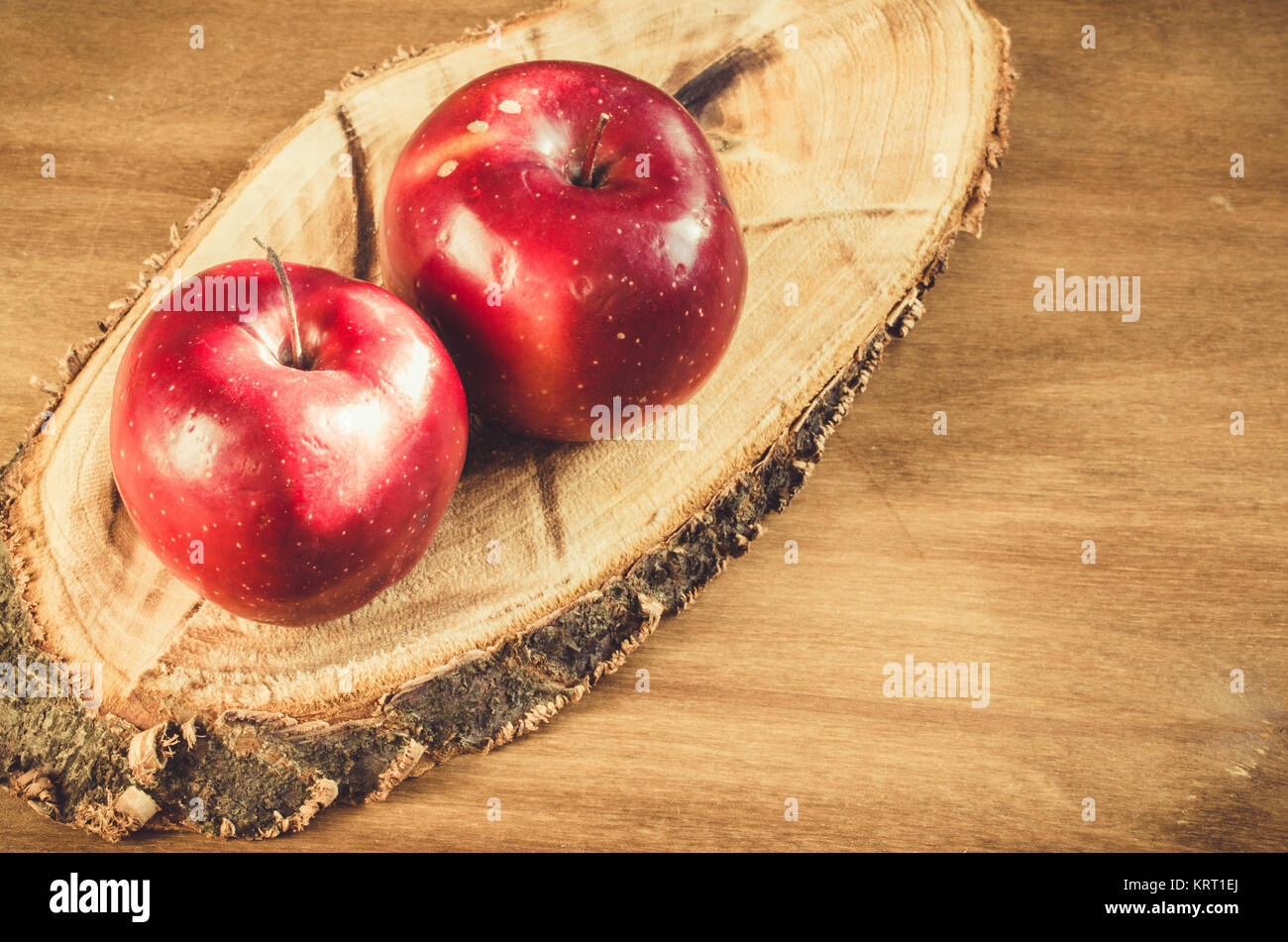 Fresh organic apples on rustic wooden background Stock Photo - Alamy