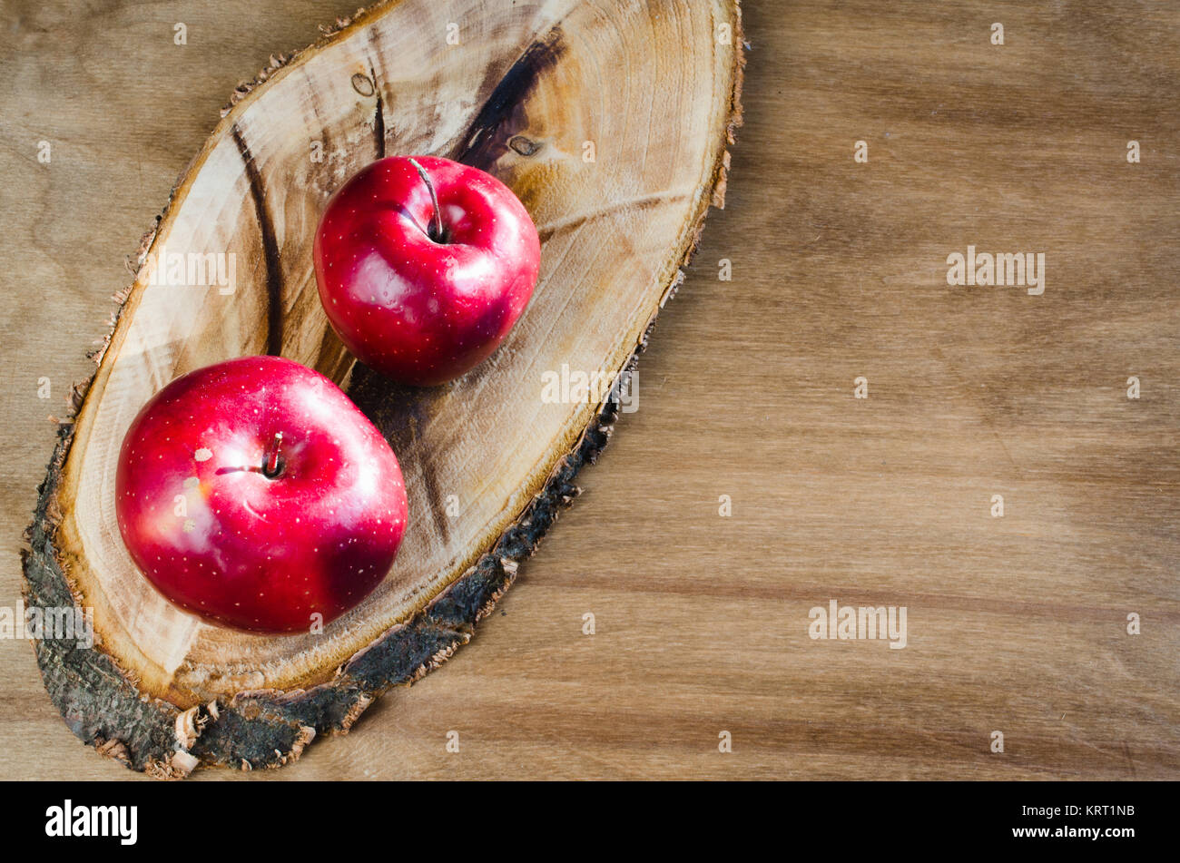 Fresh organic apples on rustic wooden background Stock Photo - Alamy