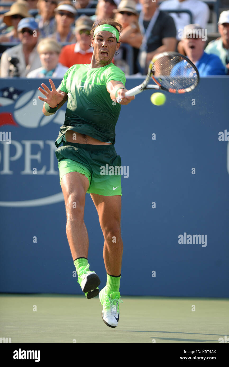 NEW YORK, NY - SEPTEMBER 02: Rafael Nadal of Spain serves defeats Diego Schwartzman of Argentina during their Men's Singles Second Round match on Day Three of the 2015 US Open at the USTA Billie Jean King National Tennis Center on September 2, 2015 in the Flushing neighborhood of the Queens borough of New York City.  People:  Rafael Nadal Stock Photo