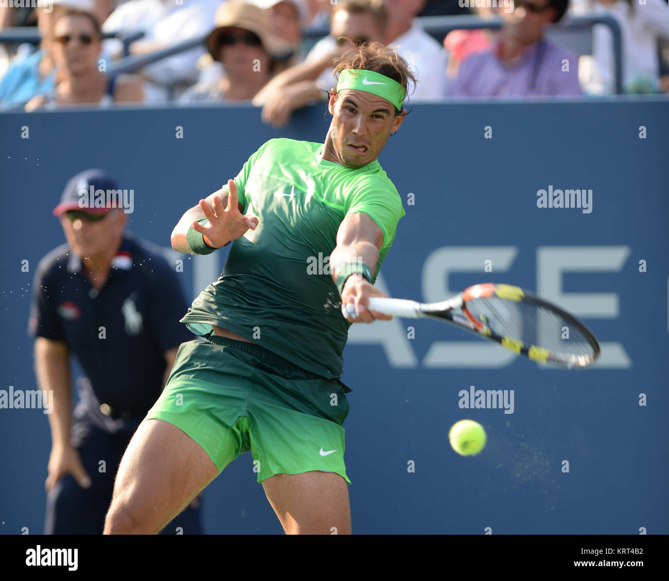 NEW YORK, NY - SEPTEMBER 02: Rafael Nadal of Spain serves defeats Diego Schwartzman of Argentina during their Men's Singles Second Round match on Day Three of the 2015 US Open at the USTA Billie Jean King National Tennis Center on September 2, 2015 in the Flushing neighborhood of the Queens borough of New York City.  People:  Rafael Nadal Stock Photo