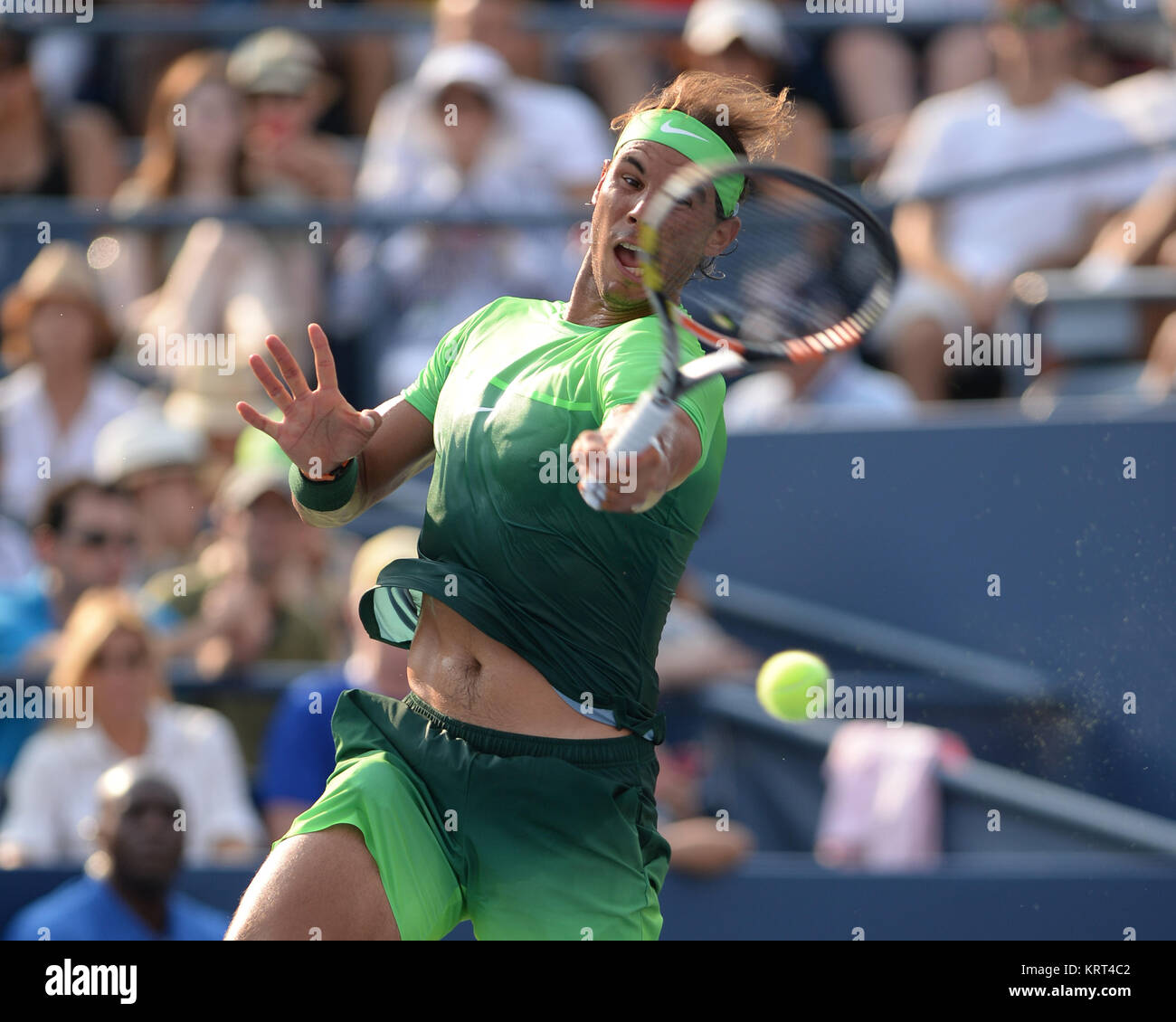 NEW YORK, NY - SEPTEMBER 02: Rafael Nadal of Spain serves defeats Diego Schwartzman of Argentina during their Men's Singles Second Round match on Day Three of the 2015 US Open at the USTA Billie Jean King National Tennis Center on September 2, 2015 in the Flushing neighborhood of the Queens borough of New York City.  People:  Rafael Nadal Stock Photo