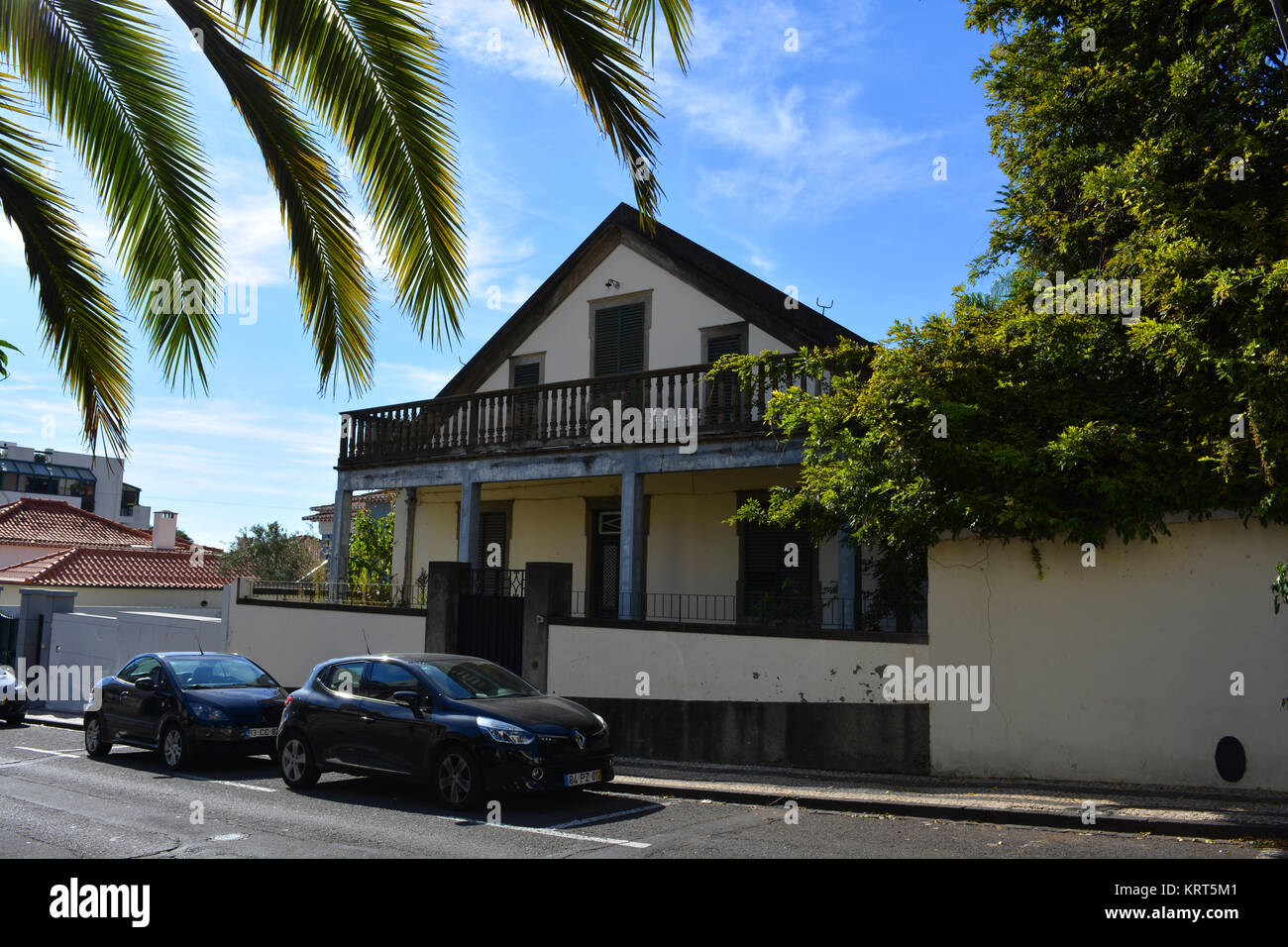 Traditional house with a sloping roof and balcony,  Rua do Jasmineiro, Funchal, Madeira, Portugal Stock Photo