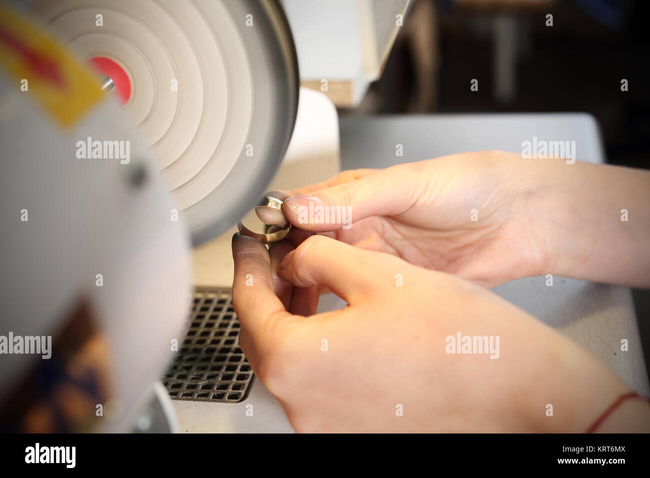 polishing jewelry. studio jewelery,manual creation of jewelry Stock