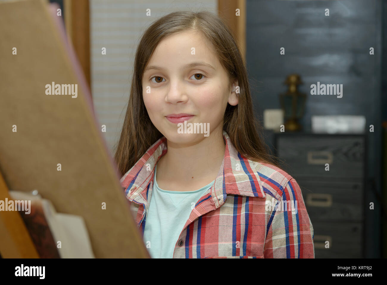 Smiling young artist girl draw Stock Photo Alamy