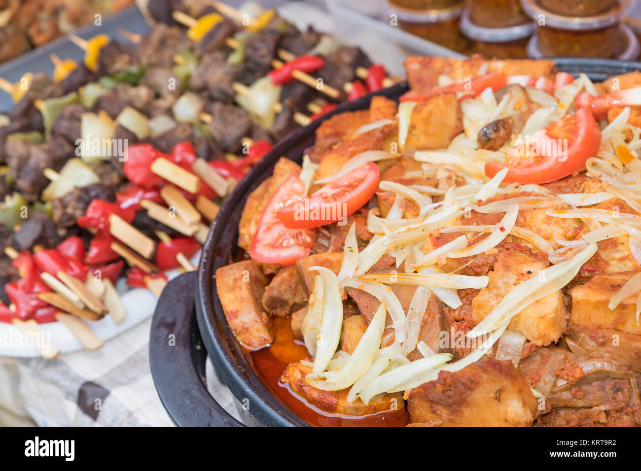 Street food The pices of beef with onion and tomatoes Stock Photo Alamy