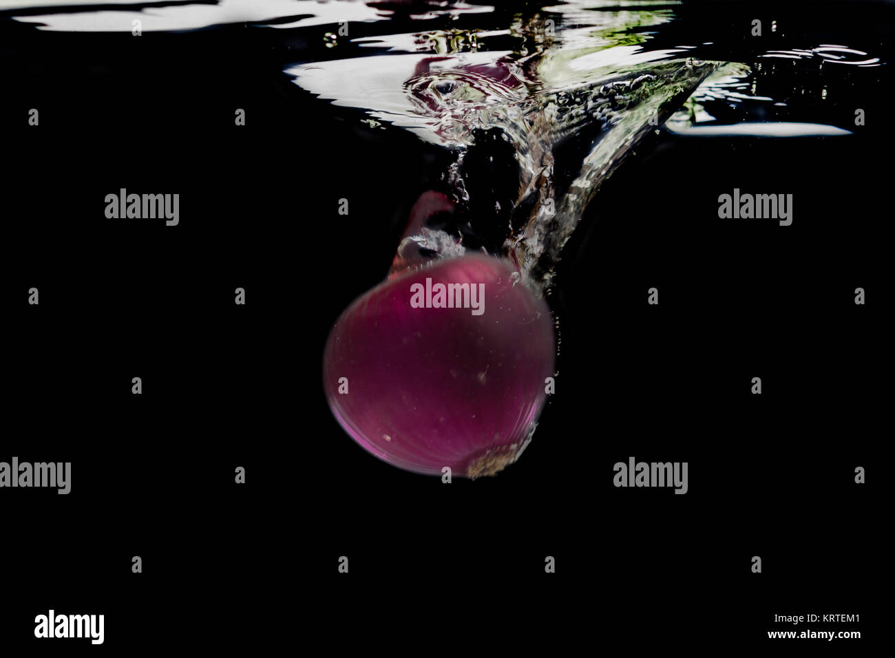 Red onion, splash of water. Stock Photo