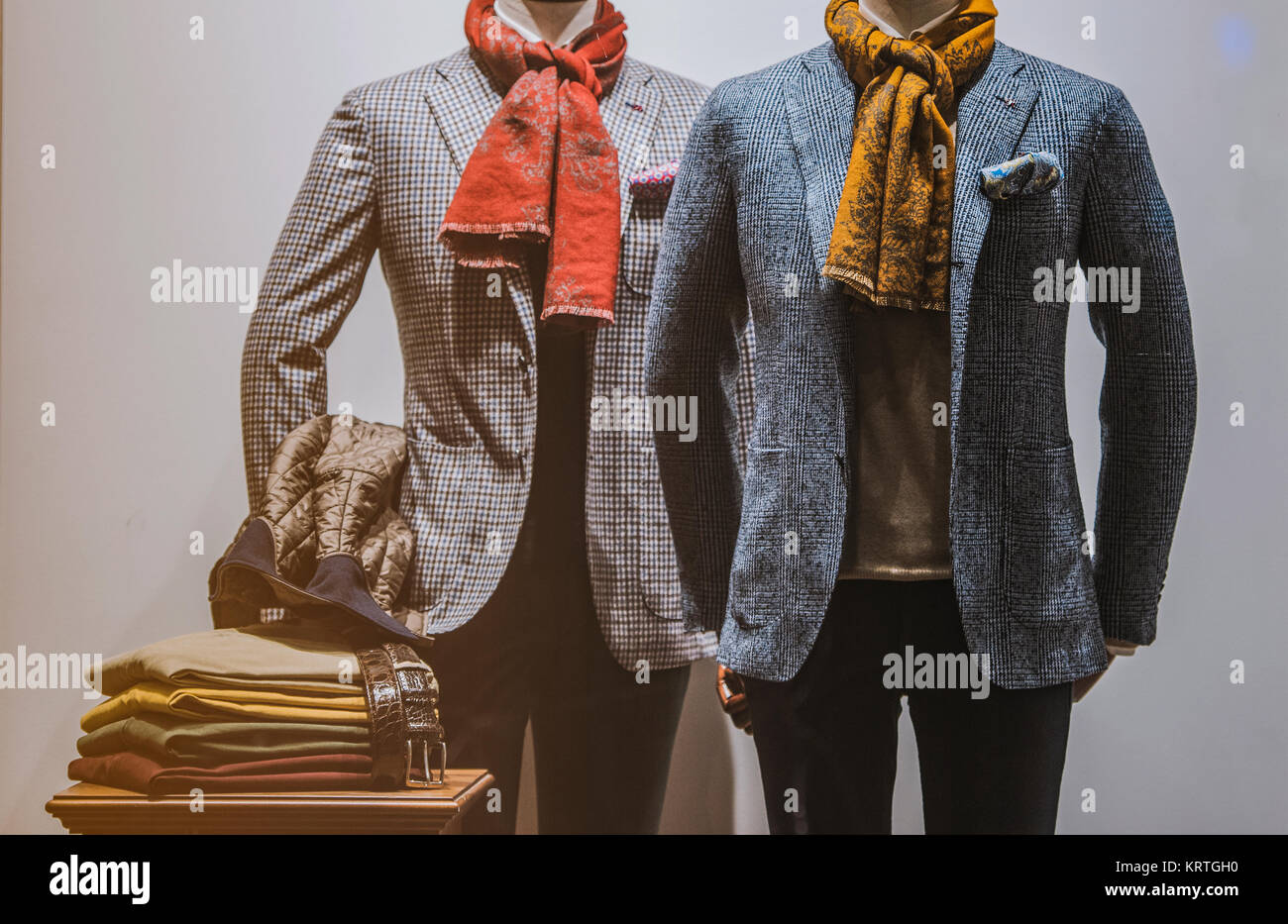 Elegant men clothing in a fashion store Stock Photo Alamy