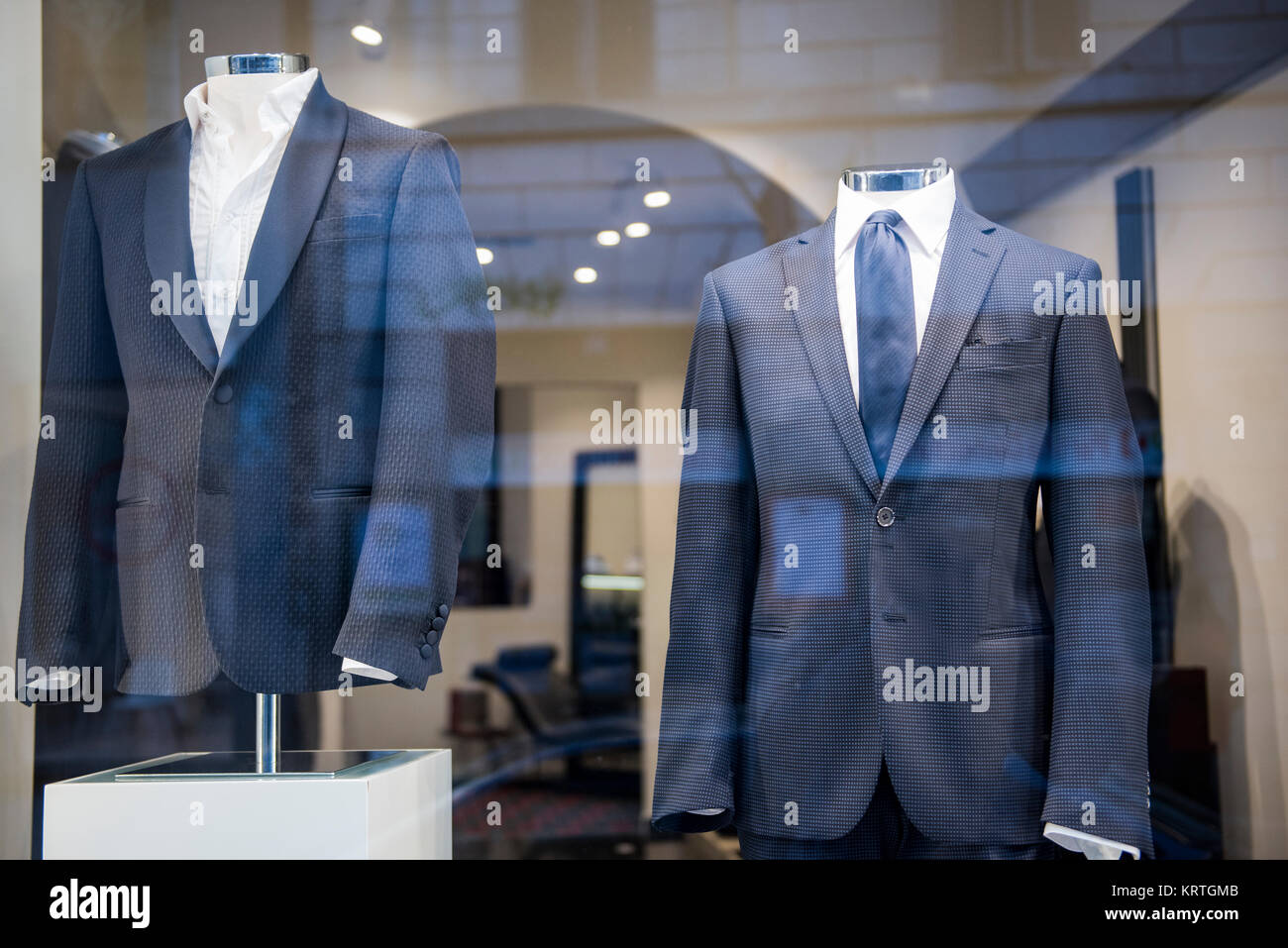 Men suits in a luxury clothing store Stock Photo