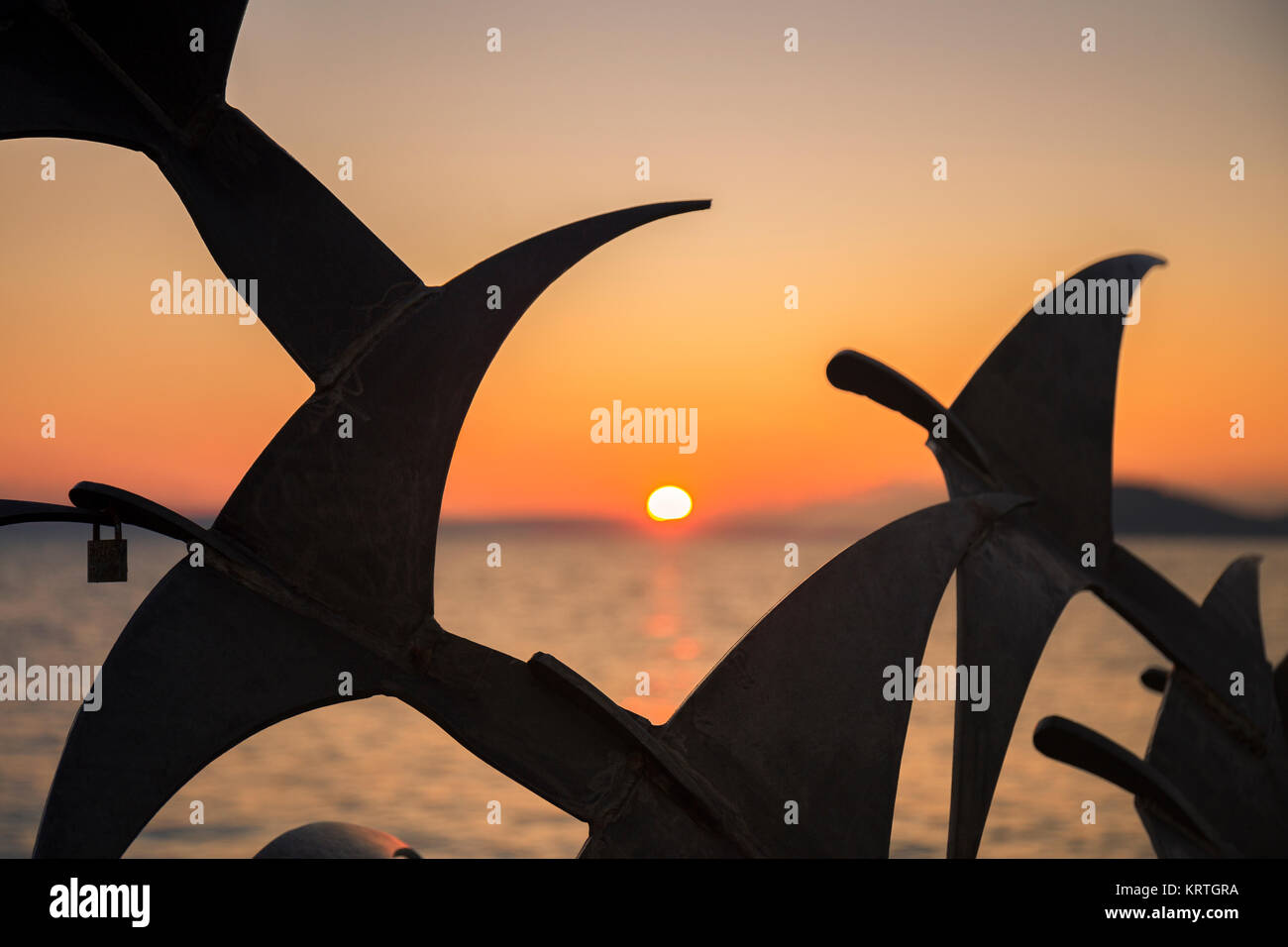 Art work in Split while the Sun came down the mountain. Stock Photo