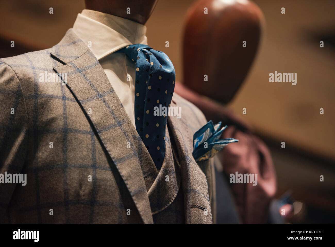 Elegant men clothing in a luxury shop Stock Photo Alamy