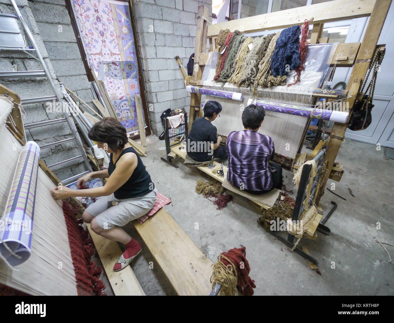Armenian carpet Yerevan, Armenia, October 2012 Women weave