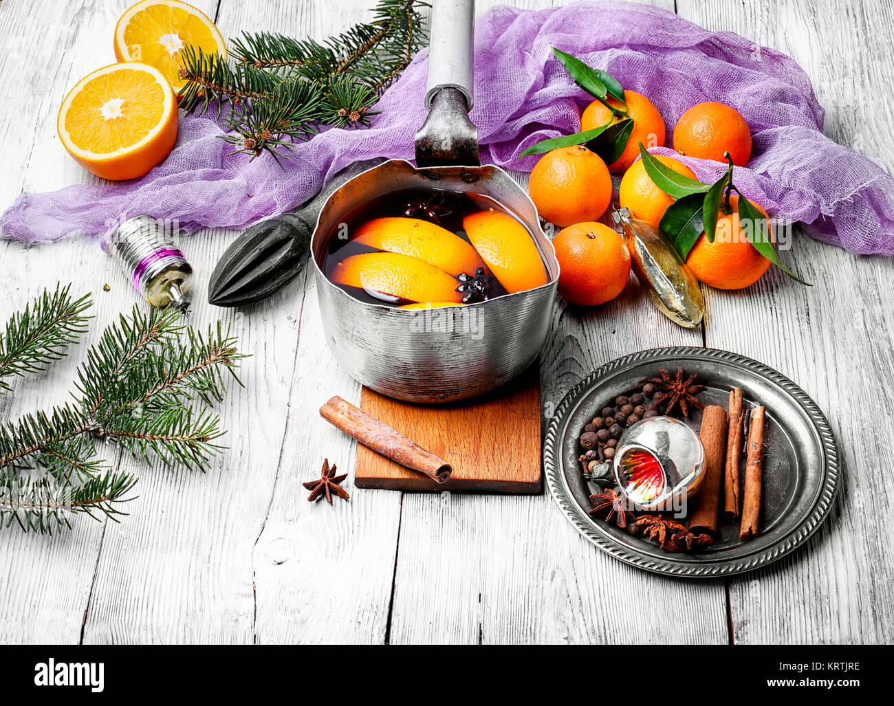 hot drink based on red wine,orange and spices in saucepan Stock Photo Alamy