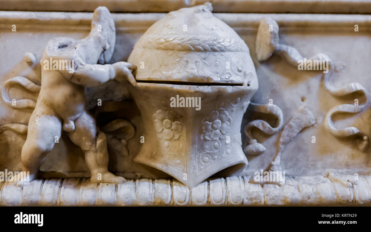 Avila, Spain - January 20th, 2014: Decorative details in an ancient tomb located inside the Monastery of Santo Tomas in Avila. Stock Photo
