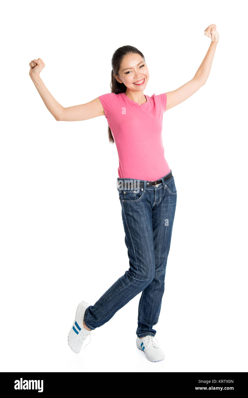 Happy young Asian girl arms raised Stock Photo - Alamy