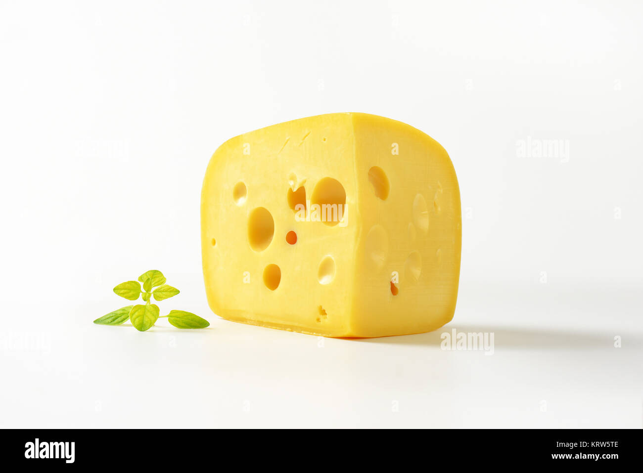 wedge of Swiss cheese Stock Photo Alamy