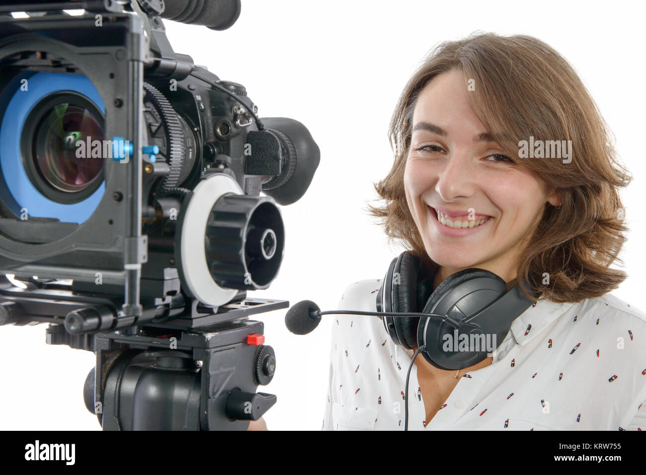 beautiful young woman with SLR video camera Stock Photo