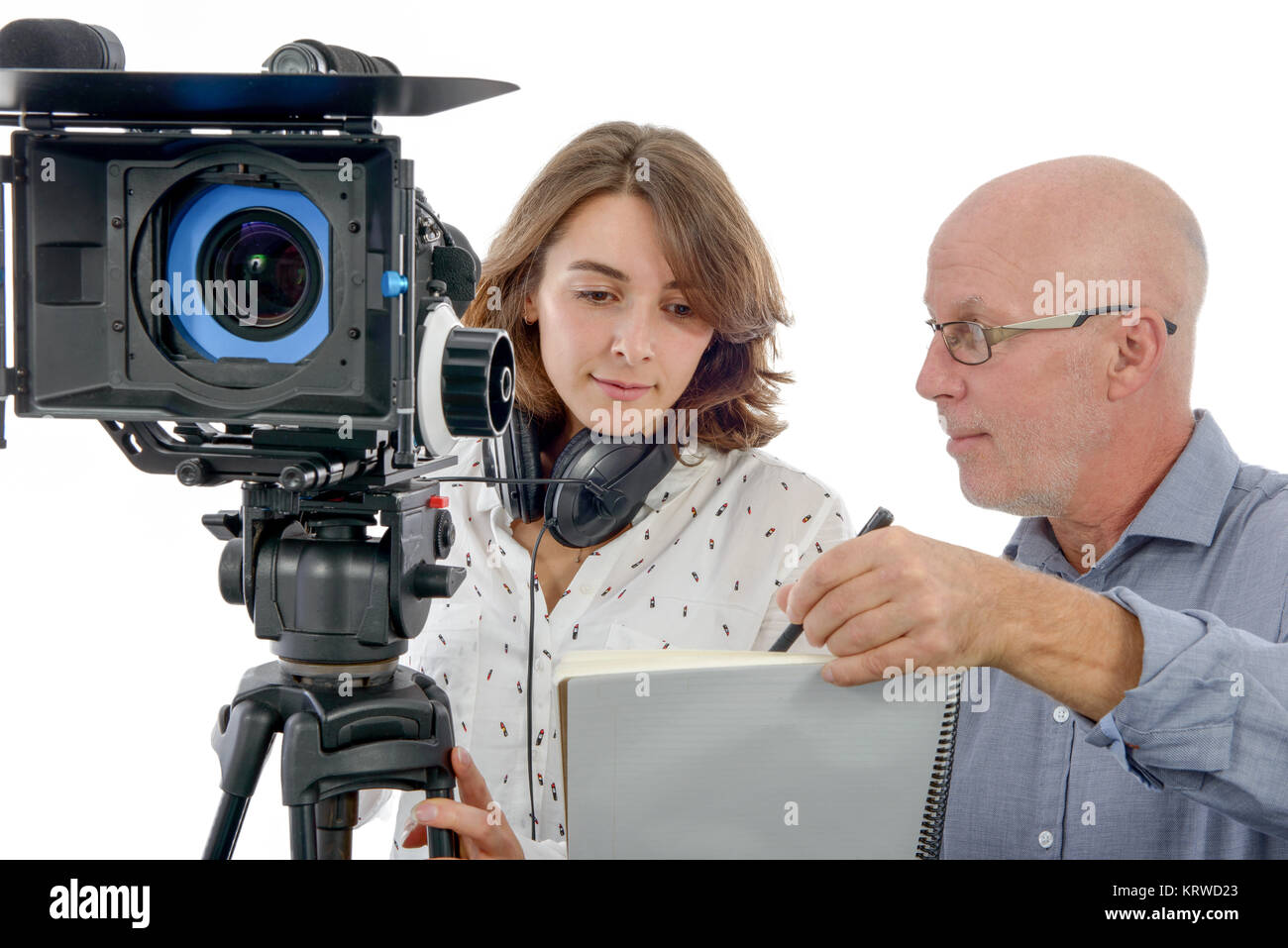young woman cameraman and the mature man Stock Photo - Alamy