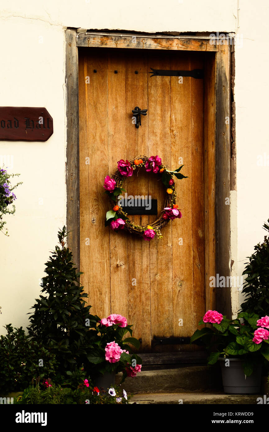 Country Door Festive Wreath On A Country Wooden Door Stock Photo