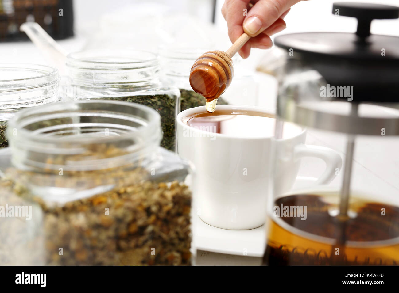 honey,sweetening with honey. tea sweetened with honey Stock Photo Alamy