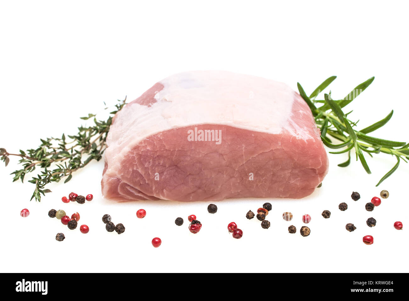 Iberico Schweinerücken roh auf weissen Hintergrund Stock Photo