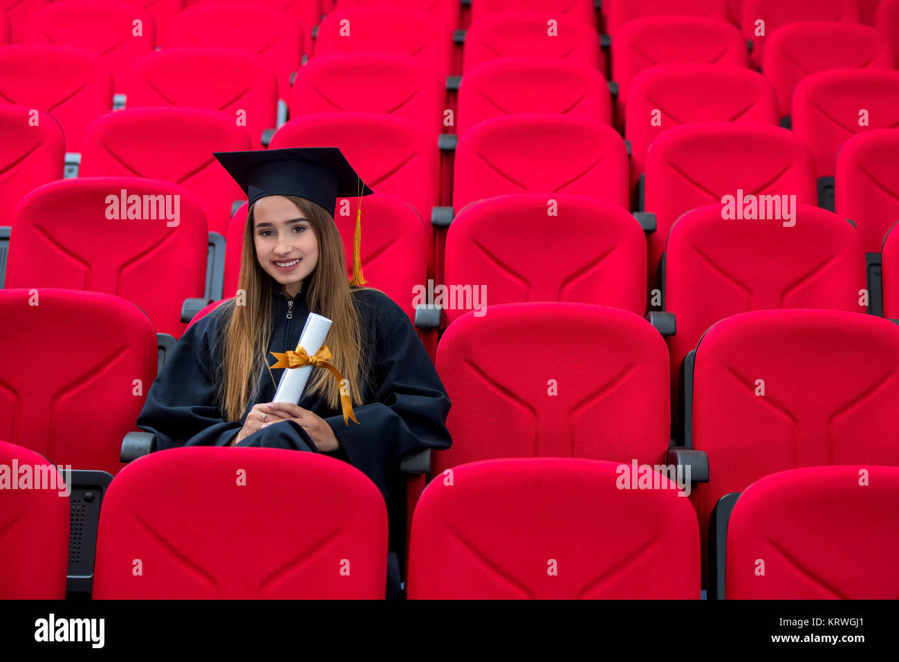 Graduation, education, portrait, red conference room, concept, portrait Stock Photo
