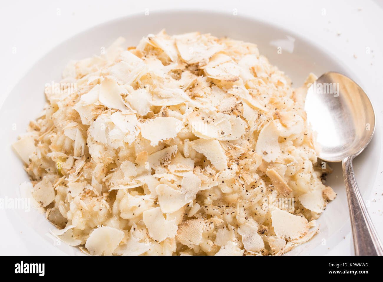 grated cheese on risotto rice Stock Photo