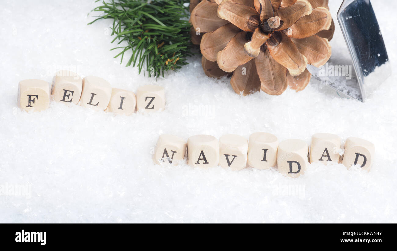 Christmas background with the Spanish words Feliz Navidad of Merry Christmas Stock Photo