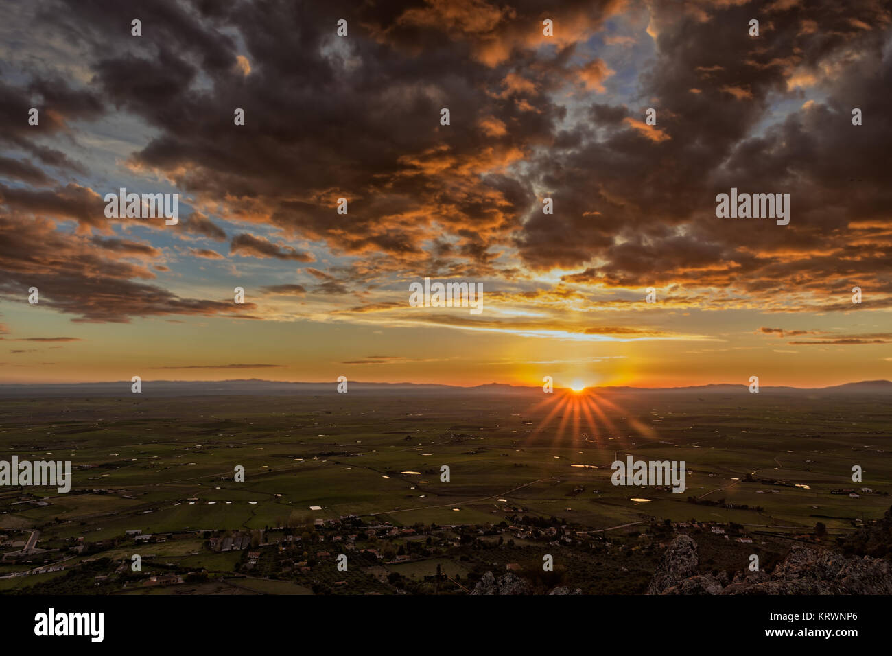 Sunrise from a mountain next to Sierra de Fuentes. Spain. Stock Photo
