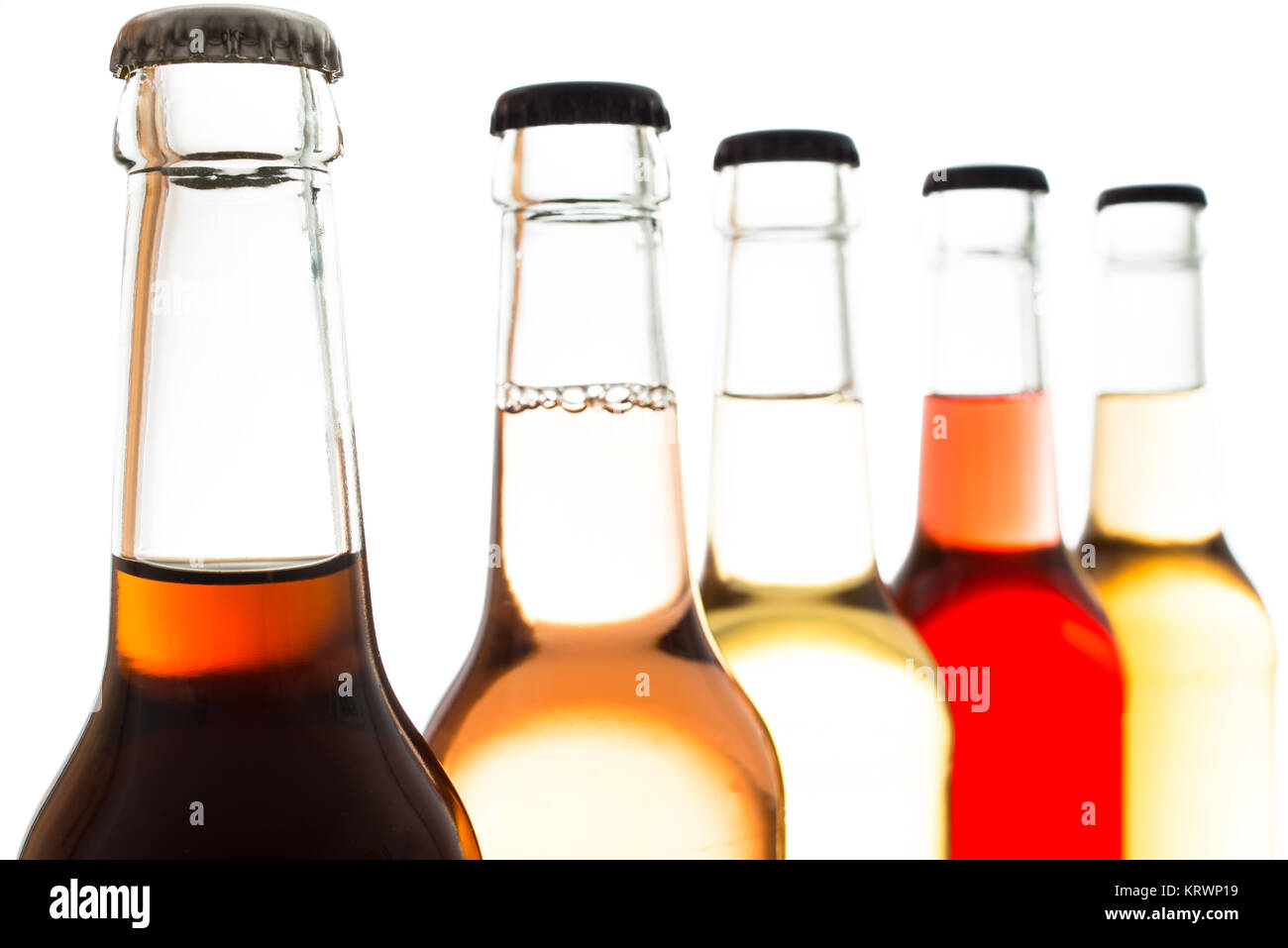 cola and lemonade in bottles with crown caps Stock Photo