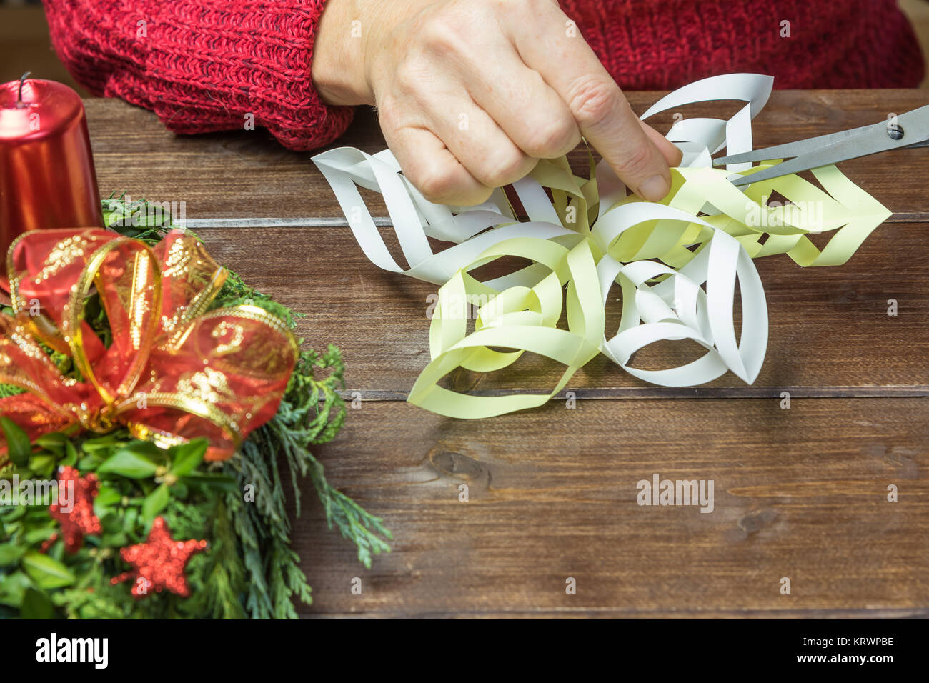 Hands cutting scissors sheet paper hi-res stock photography and images ...