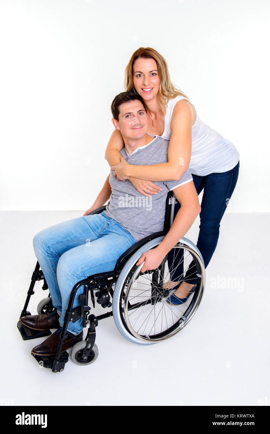 young disabled man in wheelchair and his wife Stock Photo Alamy