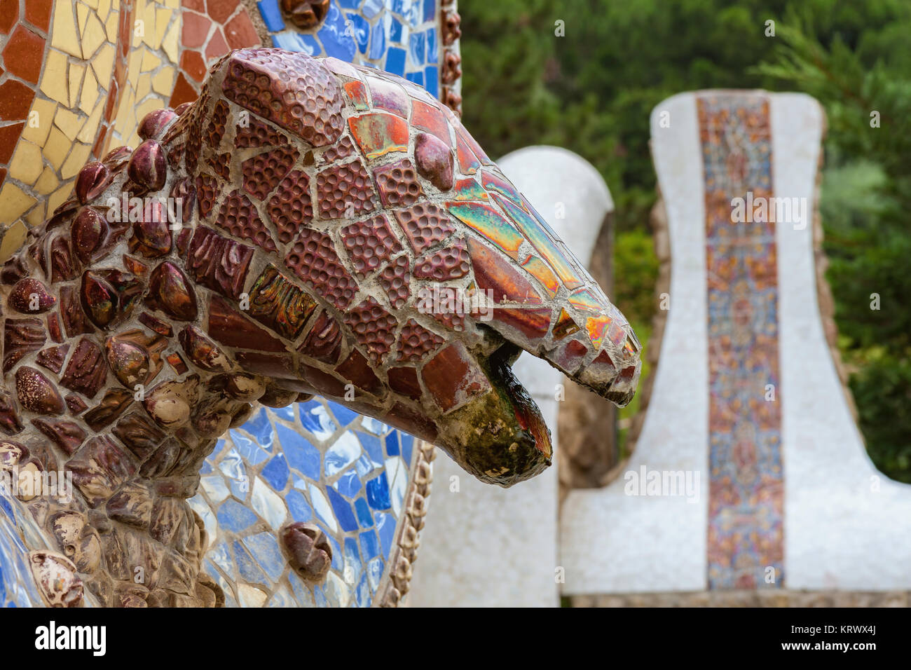 Barcelona Park Guell of Gaudi Snake and four Catalan bars in modernism mosaic, Barcelona of Spain 15 July 2010 Stock Photo