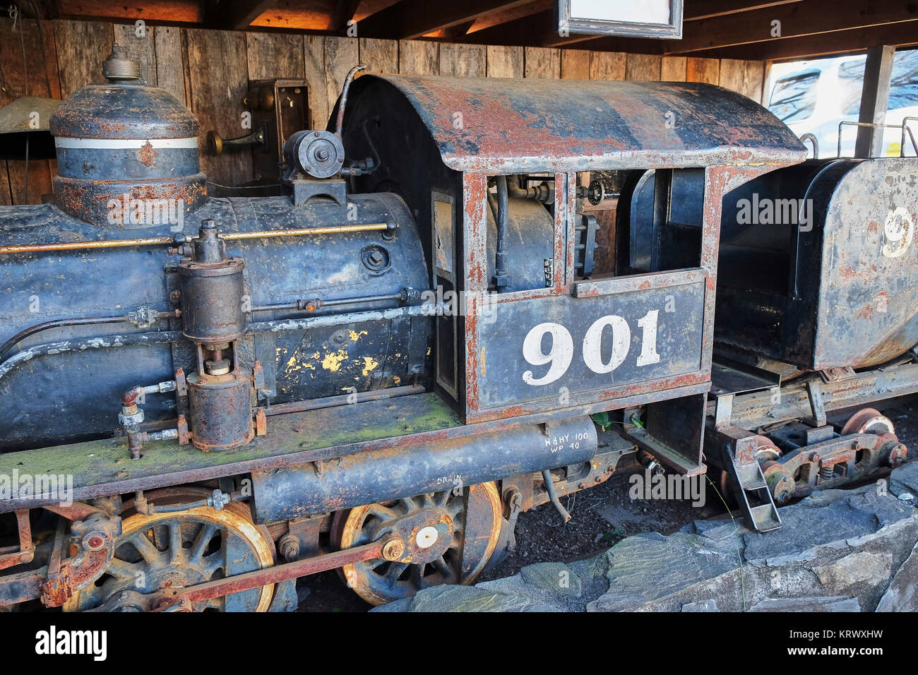 Narrow gauge 2-6-0 steam locomotive used in the 1950's for low clearance duties in Arkansas diamond mines, in disrepair, found in Warm Springs GA, USA Stock Photo