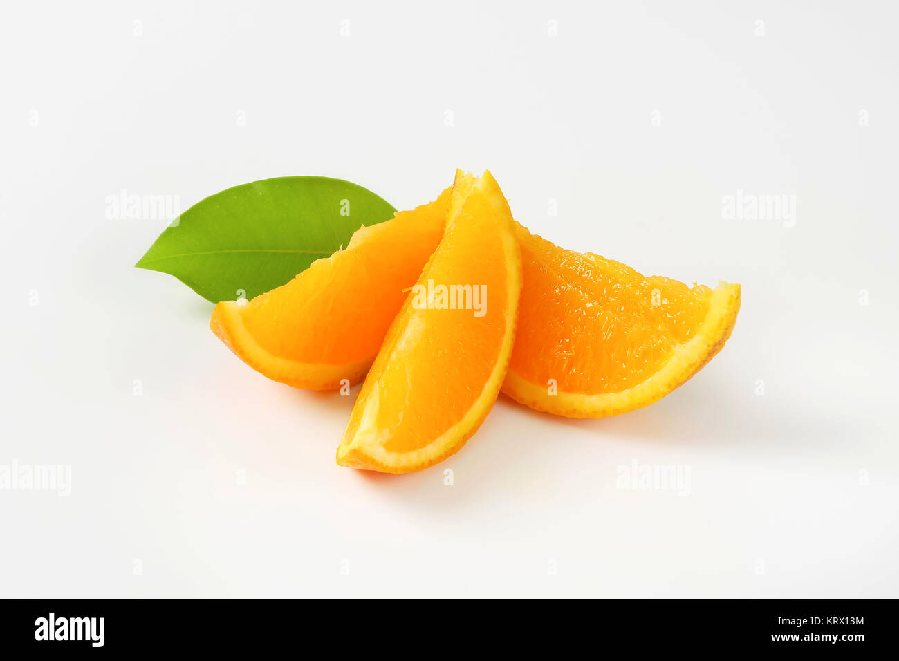 Fresh orange wedges Stock Photo - Alamy