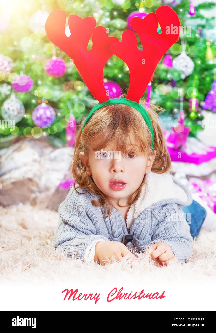 Little boy near Christmas tree Stock Photo Alamy