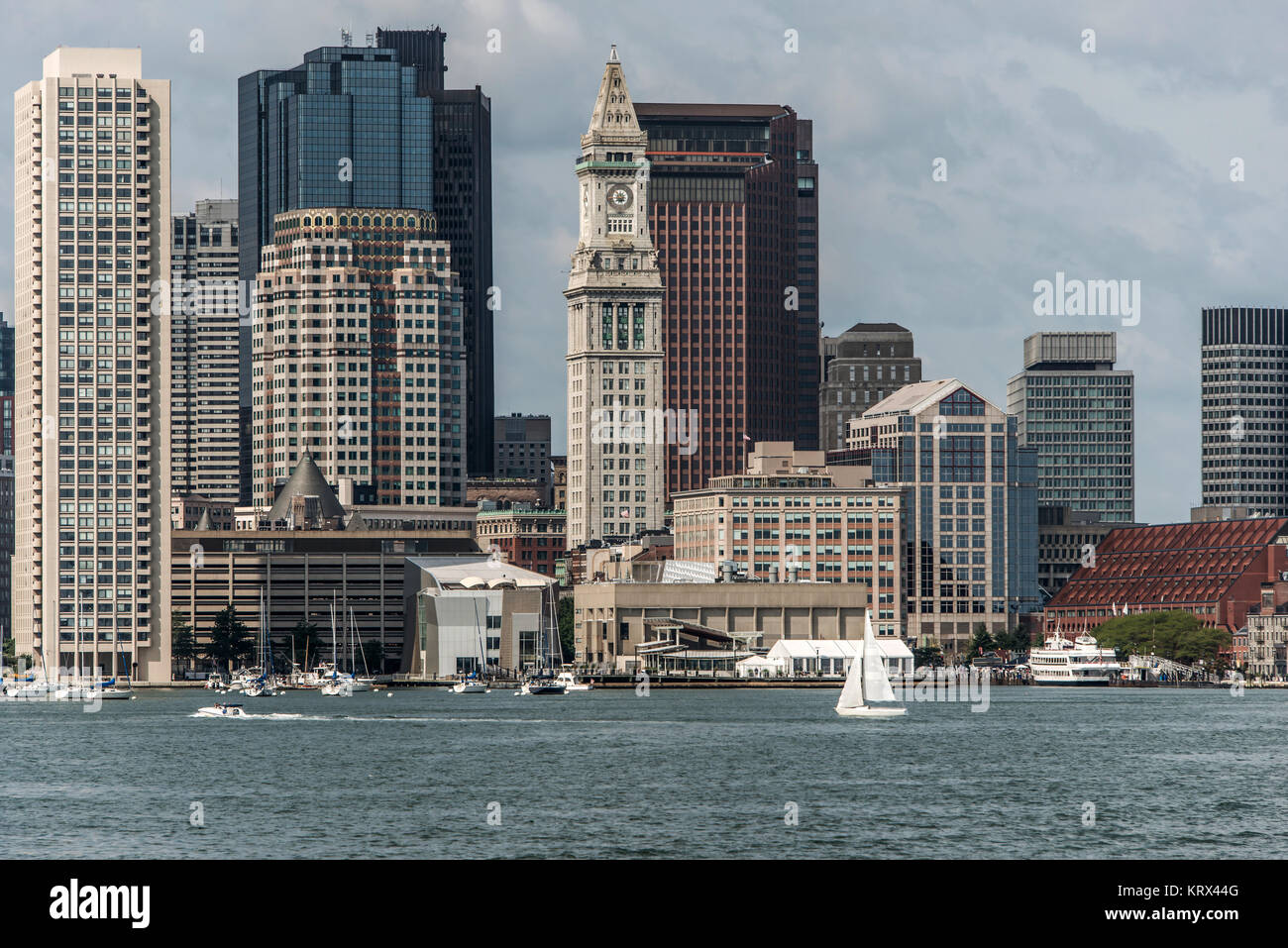 Sailing boats on the Charles River in front of the Boston Skyline in Massachusetts USA on a sunny summer day Stock Photo